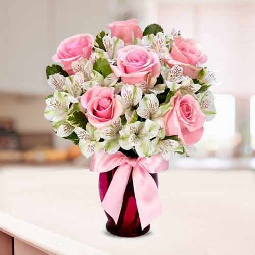 Pink Roses And White Alstromeria In Avase